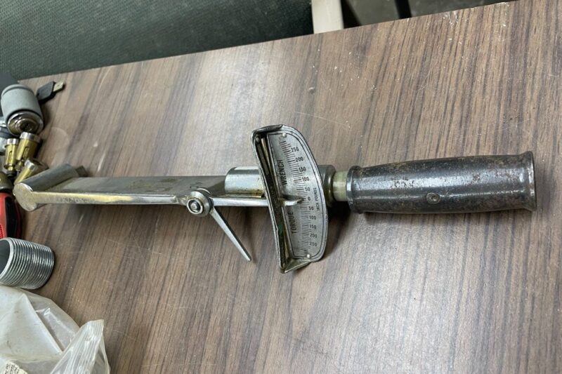 Early torque wrench designs including beam and click type mechanisms